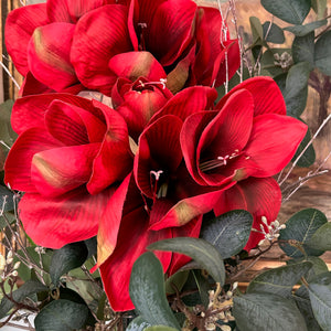 Faux red Amaryllis and berried Eucalyptus bouquet